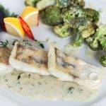 Filetto di branzino con vongole e cime di rapa