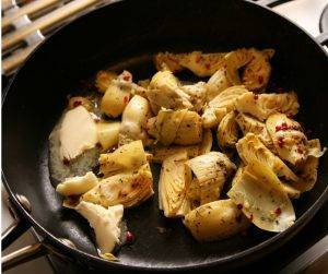 Pasta al forno con carciofi e prosciutto