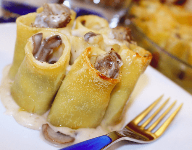 paccheri ripieni con salsiccia e funghi