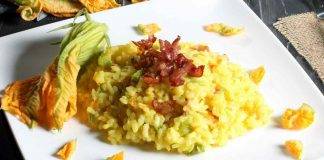 Risotto con fiori di zucca speck e zafferano