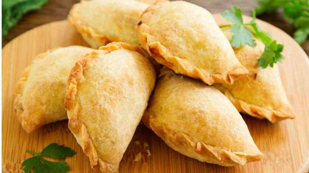 Empanadas con spinaci e prosciutto cotto al forno