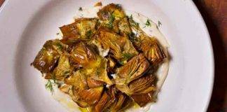 Alaccio con piselli e carciofi al forno