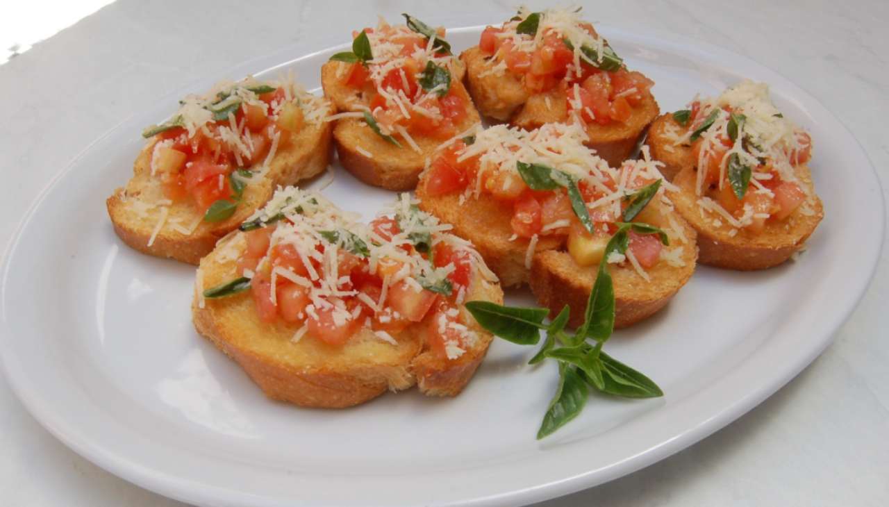 Bruschette pomodoro e parmigiano - ricettasprint