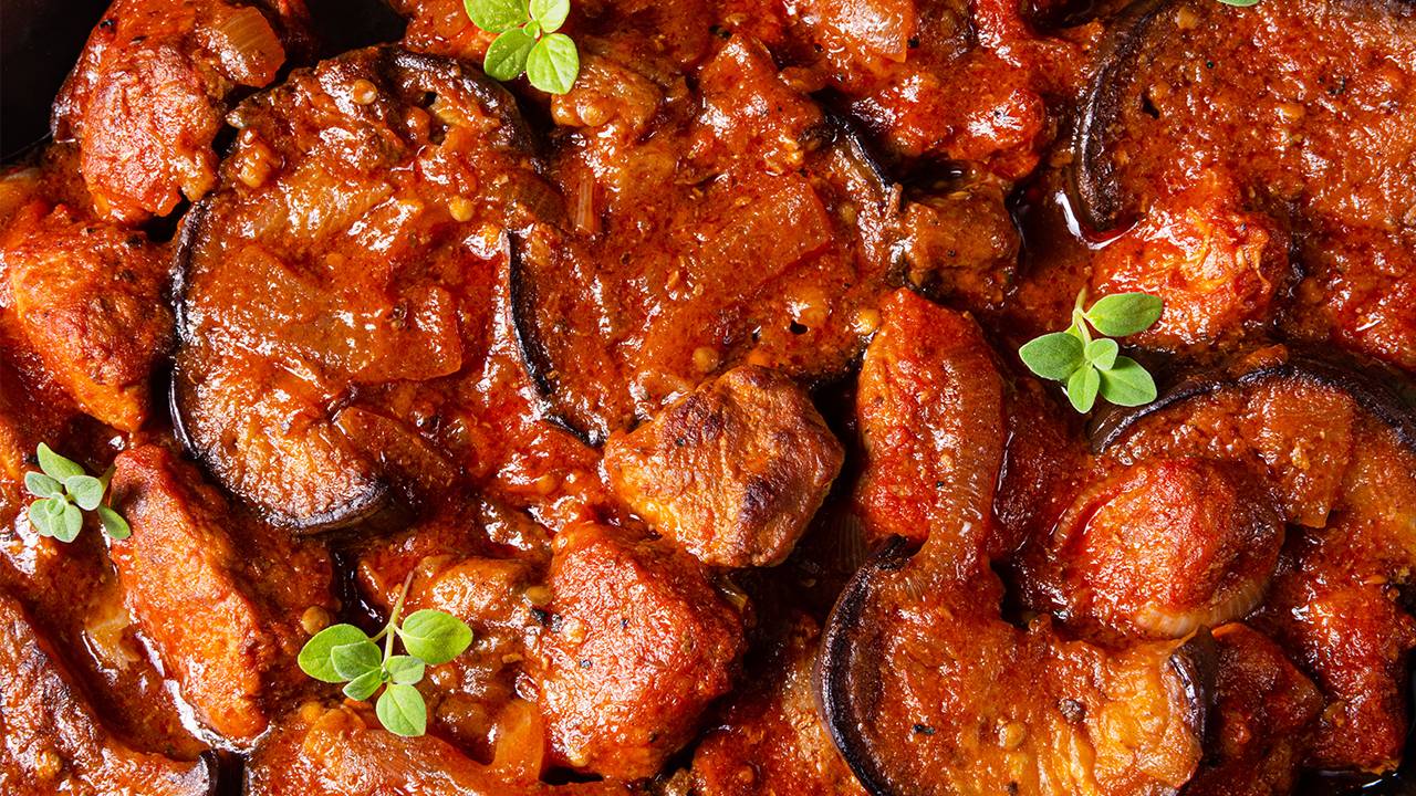 Melanzane fritte con pomodoro e cipolla.jpg