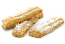 Bastoncini croccanti pistacchio e arancia, perfettamente “inzupposi” biscotti alla granella di pistacchio e arancia