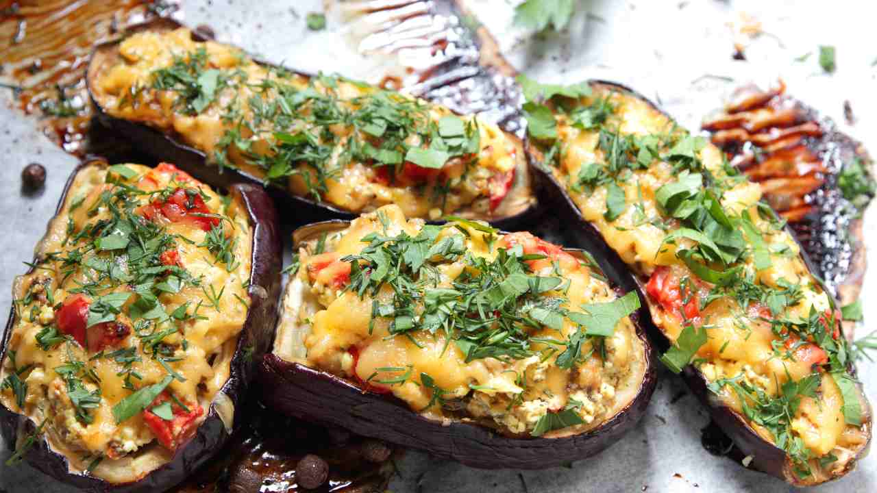 melanzane ripiene riso pomodoro e formaggio