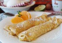 Crepes con arance | Un dessert delicato e profumato Rotolo dolci