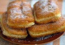 Morbidi fritti ripieni di crema al caffè | Invitanti e golosi Dolcetti rotolati nello zucchero semolato