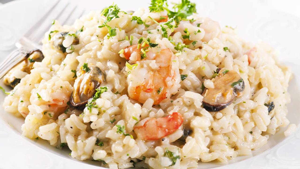 risotto con molluschi gamberi e calamari