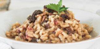 Risotto al mix di funghi con frutta secca