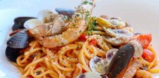 Primo al pesce di mare e pomodorini