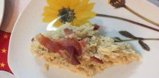 Risotto allo zafferano in salsa di birra con crudo e guanciale