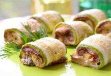 Involtini di zucchine al forno | Il contorno versatile e gustoso, scopri il ripieno! Involtini di zucchine al forno