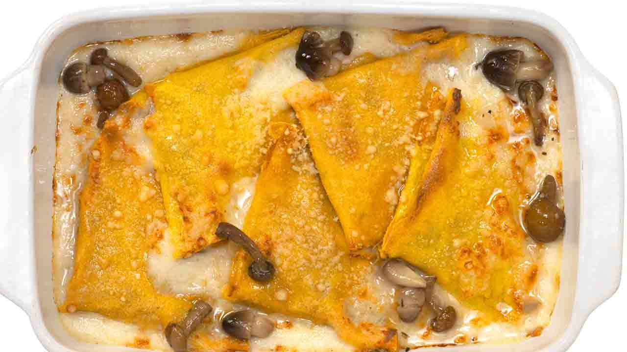 Crespelle con prosciutto funghi e besciamella