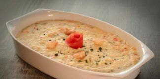 Risotto cremoso con salmone besciamella e gamberetti