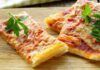 Pizza di pasta sfoglia | subito pronta e gustosa | la ricetta last minute che fa felici i bambini