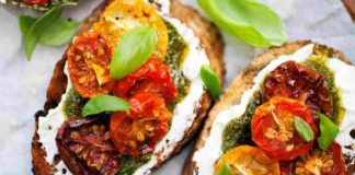 Bruschette di pane con pomodori, burrata, aceto balsamico e pesto di basilico, sconvolgi tutto stasera