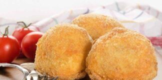 Strepitose ma non fritte, queste croccanti bombette di patate sapranno sorprenderti grazie al quel ripieno gustoso e filante