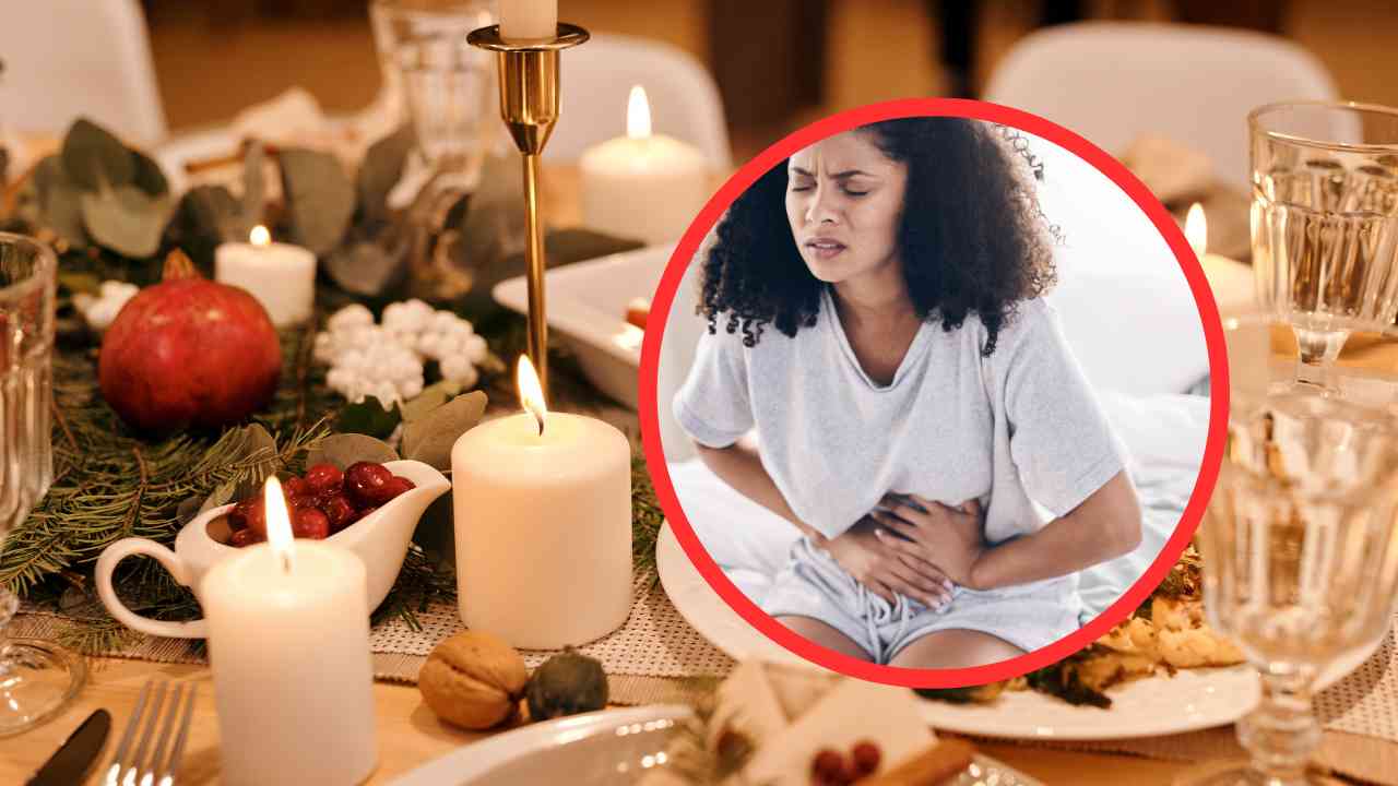 Cena e donna con problemi di digestione