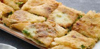 Pizza di sfoglia ripiena con broccoli e salsicce