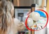 Donna davanti al frigo aperto