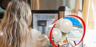 Donna davanti al frigo aperto
