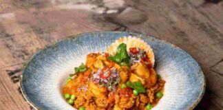 Risotto con piselli e seppie: