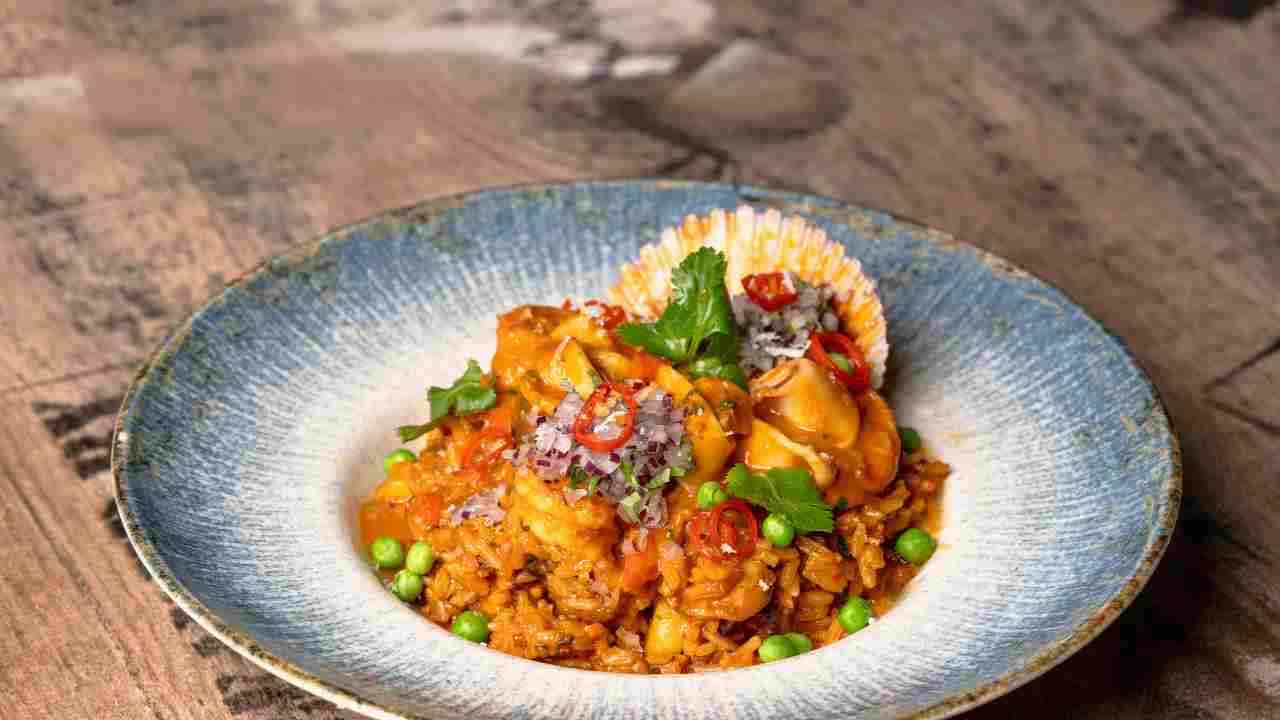 Risotto con piselli e seppie: