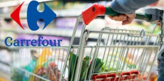 Un carrello della spesa pieno ed il logo Carrefour