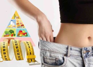 Una donna in forma ed un metro e piano di dieta
