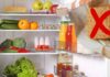 Un frigo aperto ed un dado da cucina