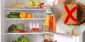 Un frigo aperto ed un dado da cucina