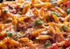 Pasta al forno con salsicce e melanzane - Ricettasprint.it