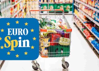 Un carrello al supermercato ed il logo di Eurospin