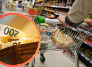 Una corsia di supermercato e delle banconote in euro
