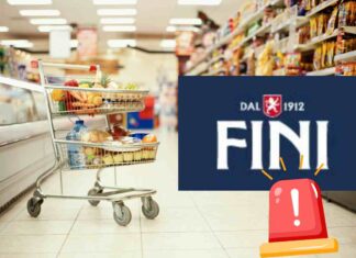 Un carrello in un supermercato ed il logo Fini