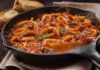 anelli di calamari al sugo in padella