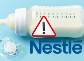 Nestlé richiama latte per bambini, l’allarme alimentare che preoccupa milioni di famiglie Biberon con latte e logo Nestlé con segnale di pericolo