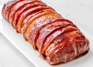 Polpettone ripieno avvolto nella pancetta - Ricettasprint.it