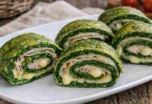 Rotolo agli spinaci ripieno di prosciutto e formaggio: quello buono che ti deve lasciare le mani unte di olio