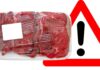 Carne confezionata e segnale di pericolo