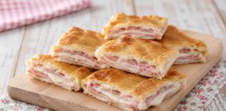 Rotolo di pasta sfoglia con prosciutto e formaggio, l’antipasto da 10 euro che stupisce Pasta sfoglia prosciutto e formaggio - RicettaSprint